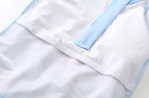 Detailed macro view of girls' light blue swimwear mesh fabric and elastic seams