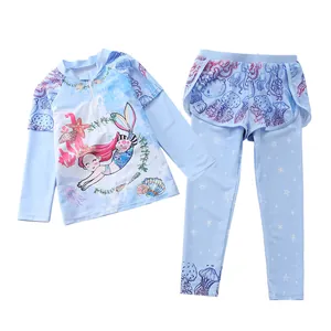 Detail of girls' long sleeve swimwear with mermaid print and ruffled skirt waist
