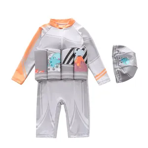 Detail van drijvend kinderzwempak met cartoon dinosaurusprint en rits vooraan