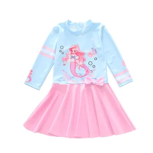 Maillot de bain fille manches longues imprimé sirène et jupe plissée rose