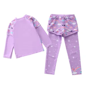 Detail of girls' long-sleeved purple swimwear set with rainbow mesh and star pattern
