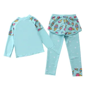 Close-up of girls' light blue long sleeve swimwear with colorful ice cream prints