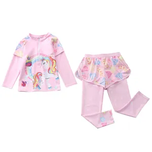 Flat lay detail of kids long sleeve unicorn swimsuit set with ruffled swim pants
