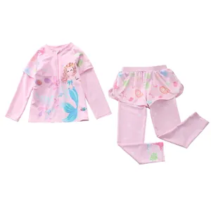 Detailed view of long-sleeve kids swimsuit with mermaid print and ruffled mesh skirt
