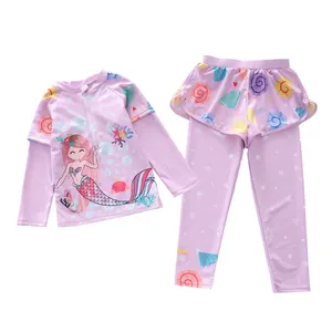 Close-up of girls purple long sleeve mermaid swimwear with detailed shell patterns