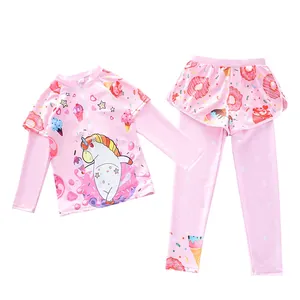 Pink long sleeve two-piece girls swimwear set with unicorn and sweet treat print