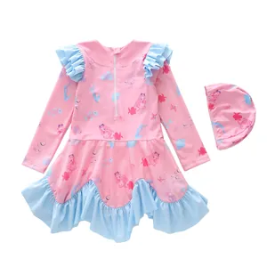 Detail of girls long sleeve swimsuit with mermaid print and ruffled blue edges