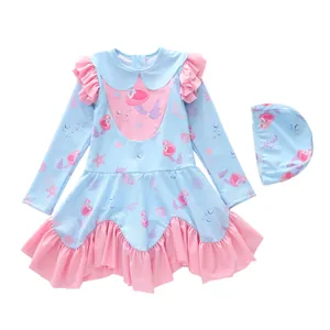 Girls long sleeve mermaid swimsuit with ruffled edges and matching swim cap set