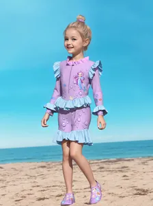 Girls long sleeve mermaid swimsuit with blue ruffles and matching water shoes