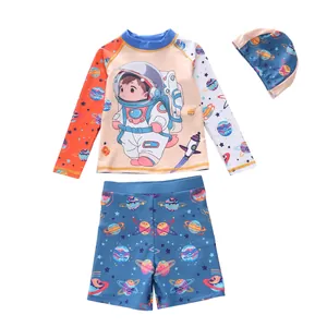 Three-piece boys long sleeve swimsuit set with cartoon astronaut and planet prints