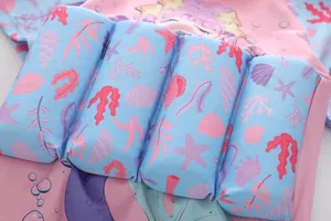Detail of pink and blue kids buoyancy swimsuit with four built-in foam safety blocks