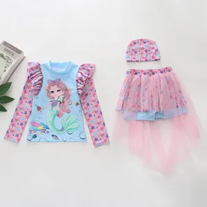 Three-piece girls' swimsuit set featuring mermaid graphic and pink mesh skirt detailing