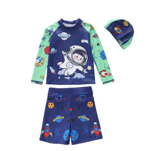 Three-piece boys long sleeve swimwear set featuring astronaut and space cartoon patterns