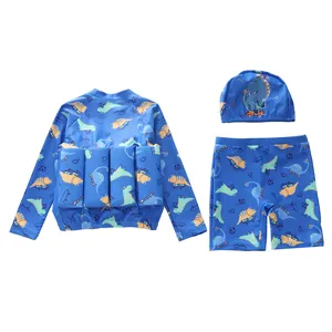 Dettaglio del set da nuoto blu con dinosauri per bambini e imbottitura galleggiante