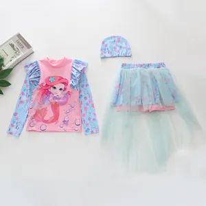 Detail of pink long sleeve mermaid swimsuit with floral ruffles and mint green tulle skirt
