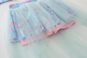 Close-up of layered tulle skirt with ocean print including starfish and coral patterns