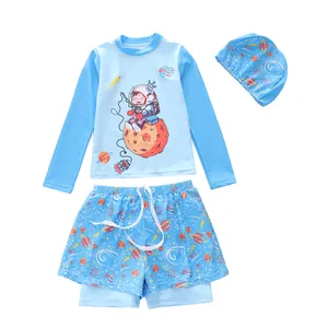 Three-piece boys astronaut swimwear set with long sleeve sun protection top and trunks