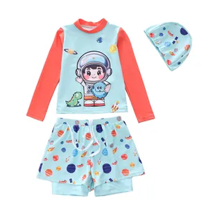Three-piece space themed kids swimwear set with long sleeves and cartoon prints