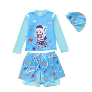 Three-piece boys long sleeve swimwear set featuring astronaut and space theme patterns