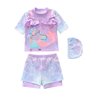 Three-piece purple mermaid swim suit for girls with ruffled bow top and matching swim cap
