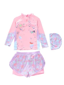 Detailed flat lay of a girls' 3-piece mermaid swimwear set with crab print and ruffles
