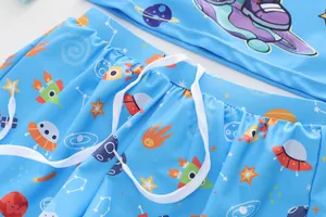 Detail of boys swimwear showing adjustable white drawstring and space cartoon prints