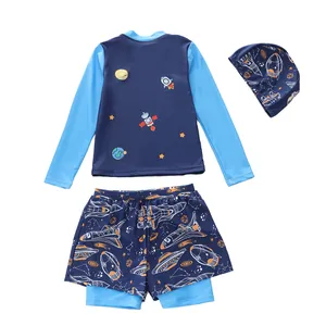 Three-piece kids long sleeve swimwear set featuring space rocket prints and swim cap