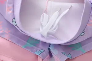 Dettaglio vita costume sirena con stampe corallo e coulisse regolabile bianca