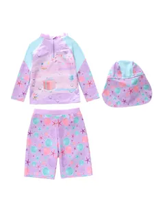 Detailed three-piece kids mermaid swimsuit set with long sleeve top, shorts and swim cap
