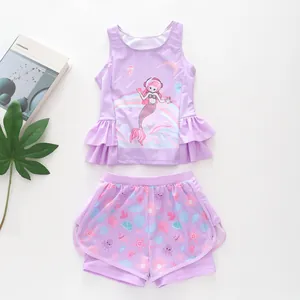 Detailed view of light purple mermaid print kids swimsuit with ruffles and mesh fabric