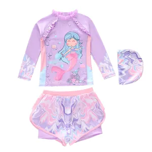 Three-piece girls mermaid swimsuit set with long sleeve top, bottoms and swim cap