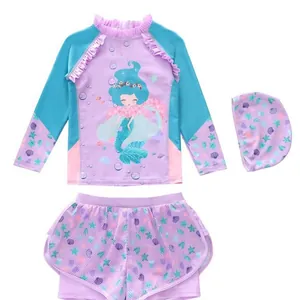 Three-piece girls mermaid swimsuit with long sleeve top, shorts and swimming cap