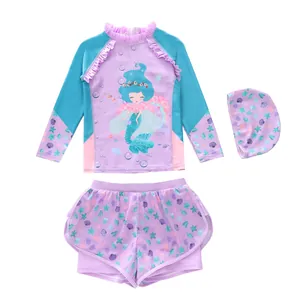 Three-piece girls' mermaid swimsuit set with long sleeve top, shorts and swim cap
