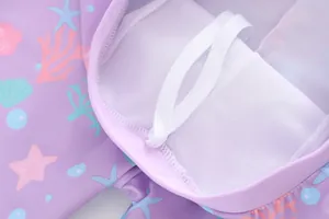 Close-up of girl's mermaid swimwear with breathable mesh lining and white drawstring