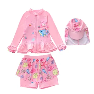 Three-piece girls mermaid swimsuit with long sleeves, floral skirt and sun hat in pink