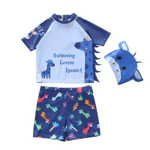 Set da nuoto per bambini tre pezzi con stampa giraffa, top con cerniera e cuffia abbinata