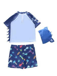 Set costume da bagno bambino protezione solare con stampa giraffa e cuffia blu coordinata