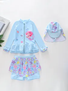 Detailed view of girls' three-piece mermaid swimwear with ruffle hem and starfish print