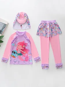 Detailed flat lay of a girls' pink three-piece mermaid swimsuit with UV protection sun hat