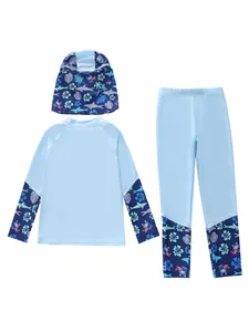Close-up of children's long-sleeve swimwear set featuring ocean-themed shark prints
