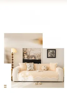 Detail of beige rose velvet sofa cushion with wavy edges and 3D floral texture