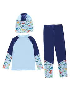 Three-piece boys long-sleeved swimwear set with cartoon dinosaur prints and swim cap