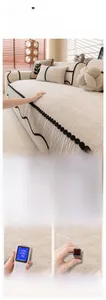 Close-up of cream chenille sofa cover with striped texture and black pom-pom lace edge