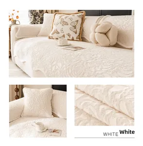Close-up of white embossed floral rose velvet sofa cover with soft plush texture details
