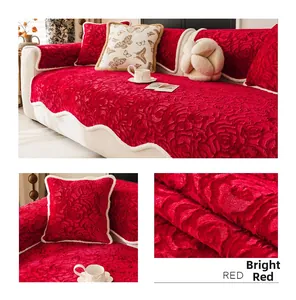 Detail of red rose pattern velvet sofa cover with white wavy edges and plush texture
