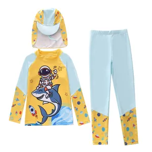 Three-piece kids sun protection swimwear with long-sleeve astronaut and shark prints
