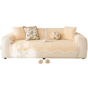 Quilted rose velvet cream sofa cover set with floral pattern and decorative pillows