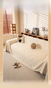 Detail of thickened cream velvet sofa cover showing woven diamond texture and soft plush fabric