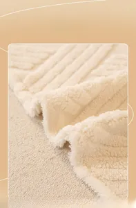 Close-up of thick cream white sherpa fleece fabric with vertical stripe texture and soft feel