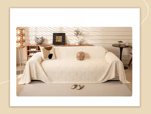 Close-up of white fleece sofa cover showing thick woven texture and cozy fabric details